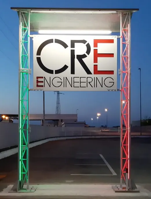 Insegna aziendale di CRE Engineering. Company sign. Storia aziendale. History